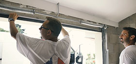 Rénovation porte de garage sectionnelle à Villars les Dombes Rénovation porte de garage sectionnelle à Villars les Dombes